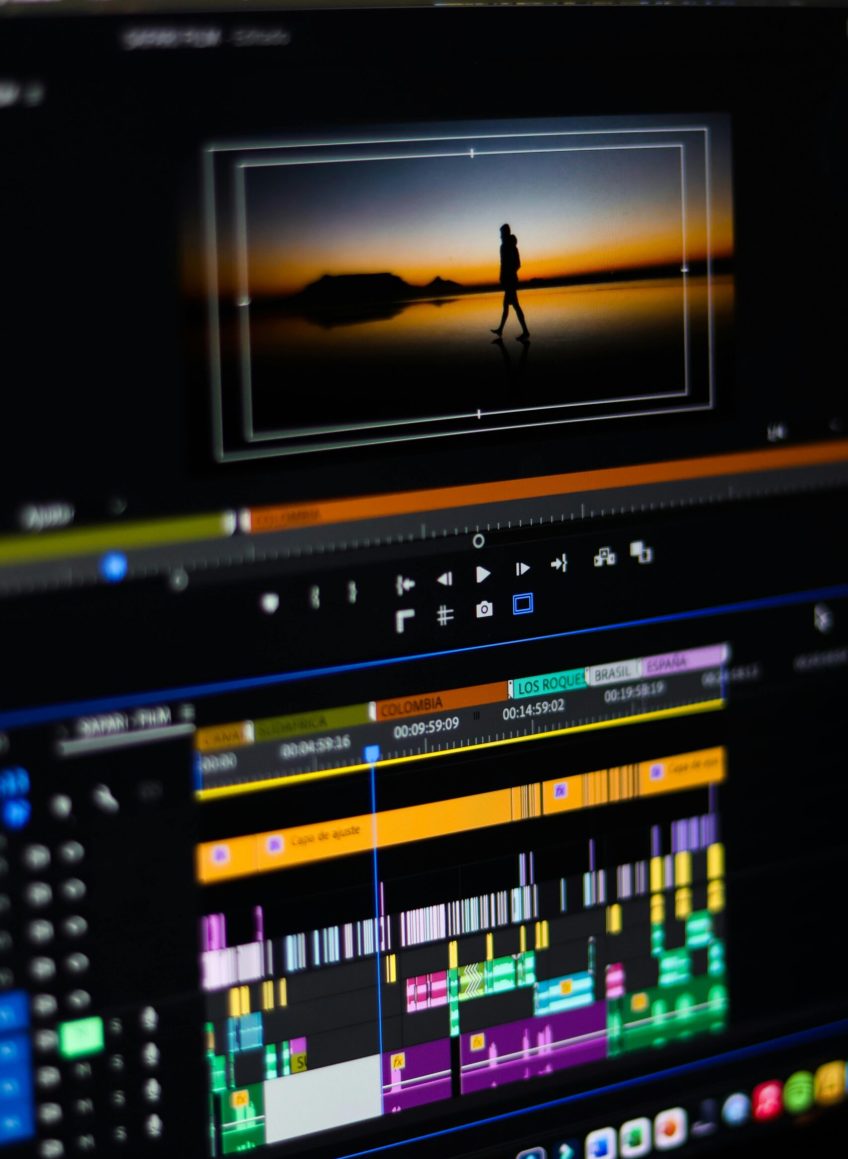 Close-up of video editing software interface on a computer monitor showing timeline and preview.
